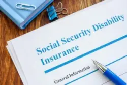 social security disability insurance application sits on table