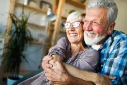 Happy elderly couple approved for Social Security benefits.
