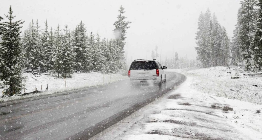 car driving on snowy road