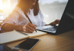 close-up of woman doing research online