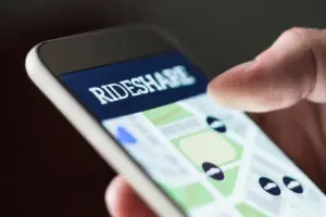 person accessing rideshare app
