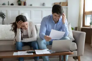 young couple dealing with bills