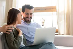 happy-couple-reviewing-their-loan-paperwork