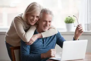 older couple receiving good financial news
