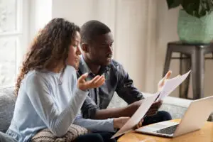 black couple discussing finances