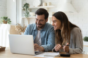 couple happily discussing finances