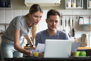 young couple checking loan application