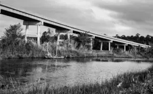 black and white image of a bridge