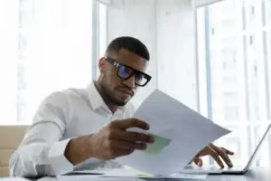 black man reviewing his budget
