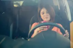 Woman Texts And Drives