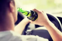 A Man Drinking Beer Behind The Wheel Before A Drunk Driving Accident