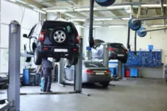 mechanic-works-in-lifted-car