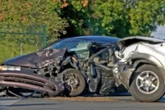 two-severely-damaged-vehicles-after-a-car-accident-caused-by-a-medical-emergency