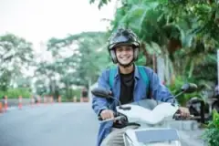 happy-motorcyclist-on-the-road