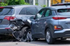 Two cars after a wreck. In this situation, you can work with a car accident lawyer in Brownsburg, Indiana.