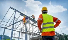Construction workers on a job. Find out how to seek fair damages with a construction accident lawyer in Avon, Indiana.