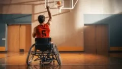 Paralyzed man in wheelchair plays basketball. Our Chesterton catastrophic injury lawyer can help you recover your losses if you’ve been permanently injured.