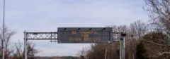 An electric highway sign reads, “Be thankful for sober drivers.”
