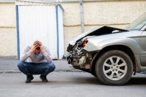 A man trying to understand who is at fault after his accident with a semi-truck.