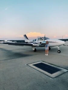 Caroline In Front Of Plane