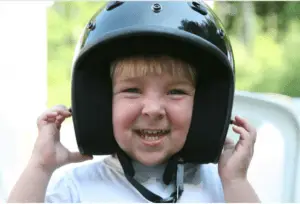 Kid wearing a helmet