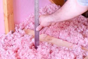 Attic insulation helps in hot climates. Measuring the thickness of your attic insulation can tell you something about how efficient it is.