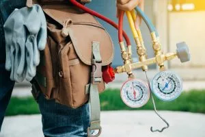 Professional With Tools To Handle Hvac Maintenance