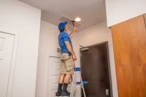 handyman cleaning air ducts