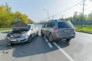 two cars on the road after an accident