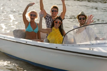 people enjoying a boat ride