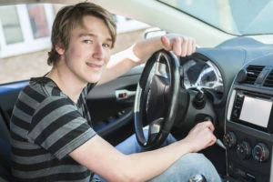 teen in a car