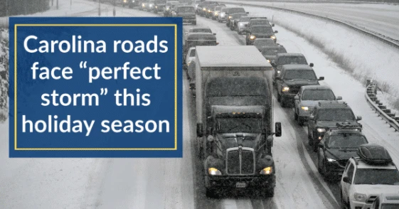 truck and cars driving in the snow