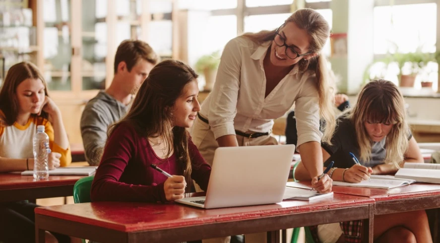 smiling-teacher-with-her-students