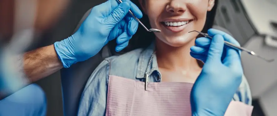 woman getting a dental cleaning