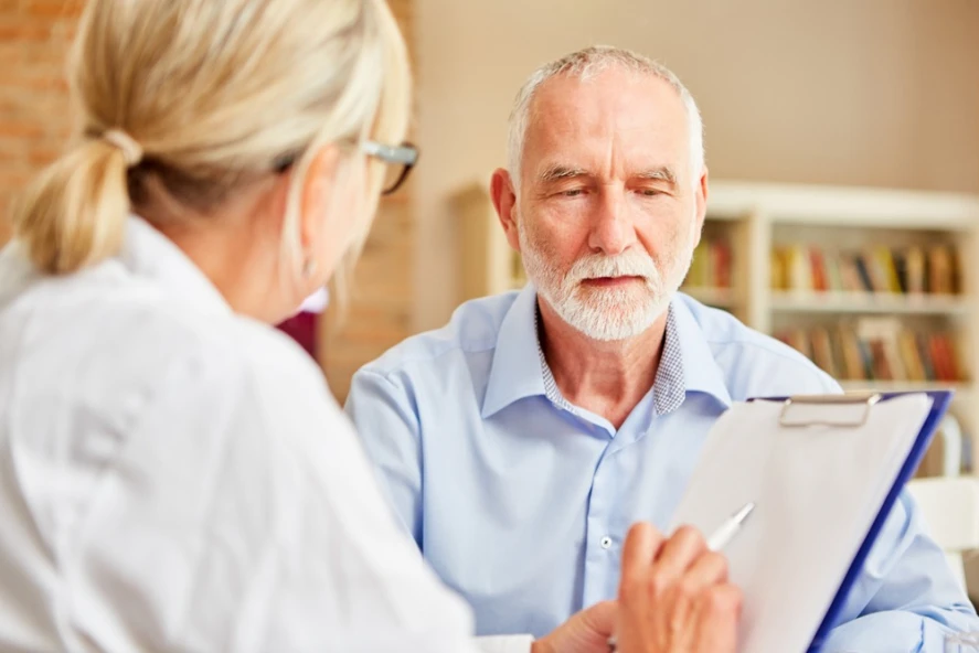 physician working with a patient