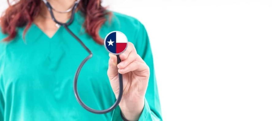 A female nurse holding a stethoscope with a Texas symbol.