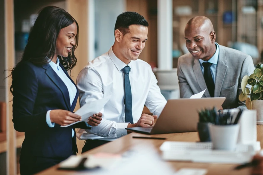 A smiling group of professional license defense lawyers.