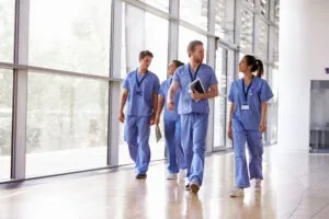 nurses walk together after Texas board of nursing hearing