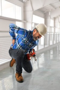 construction worker with back pain