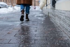 Selective,Focus,On,Technical,Salt,Grains,On,Icy,Sidewalk,Surface