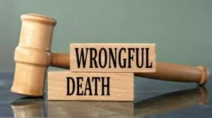 Wrongful,Death,-,Words,On,Wooden,Blocks,With,A,Judge's