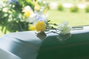 close-up of roses on a coffin