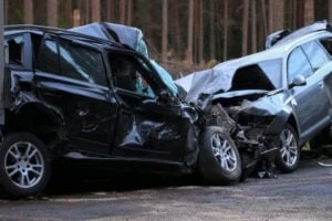 two crushed cars in an accident