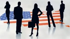 Silhouetted immigrant professionals standing near a flag map of the United States.