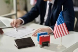 Desk with American flag and stamps