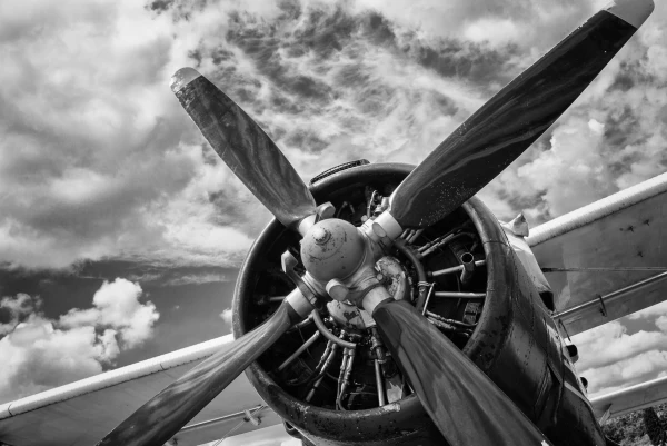 Close up of old airplane in black and white