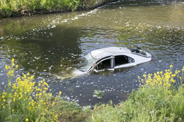 Sports Car Into Creek in Dallas