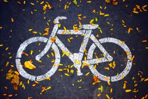 Riding a bicycle is a great way to reduce a person’s carbon footprint and promote health and well-being.