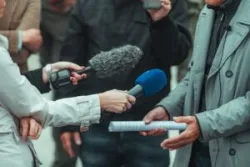 An individual speaking to the media after determining how to make a whistleblower complaint.