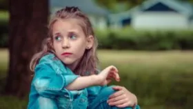 child with sad expression during divorce